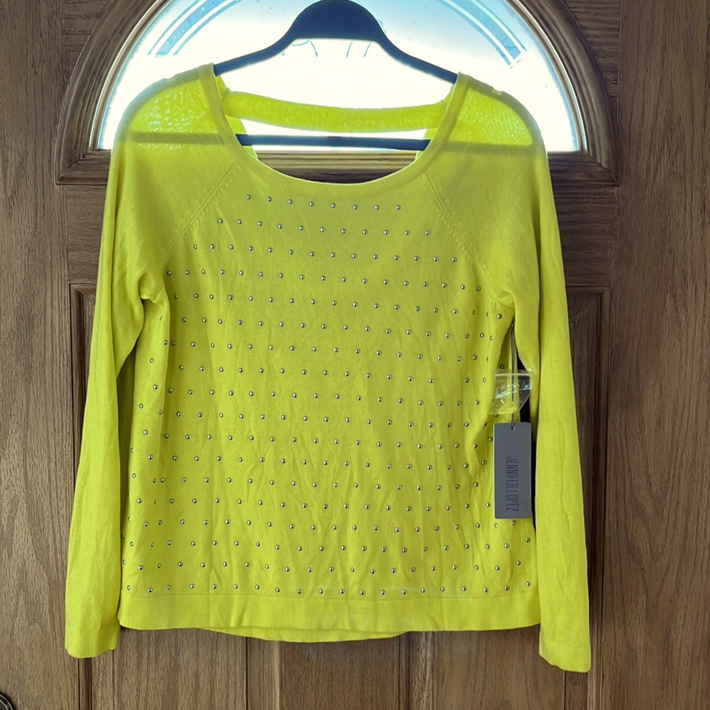 Jennifer Lopez charchuse in color BRAND NEW! Size L. Light weight sweater.